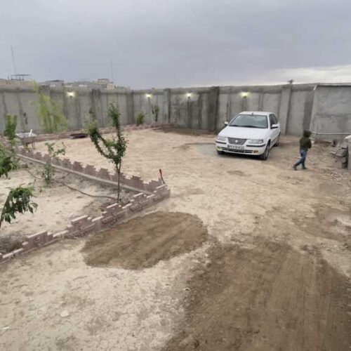 زمین باغچه ای چهاردیواری 242 متر با کاربری مسکونی و ویلایی